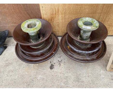 A PAIR OF GARDEN WATER FEATURES FORMED FROM CERAMIC ELECTRICITY RESISTORS 