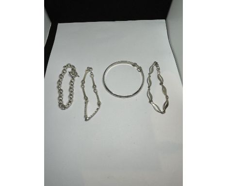 FOUR MARKED SILVER BRACELETS TO INCLUDE A BANGLE 