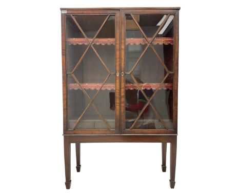 19th century mahogany framed bookcase on stand, fitted with two astragal glazed doors enclosing two shelves over three drawer