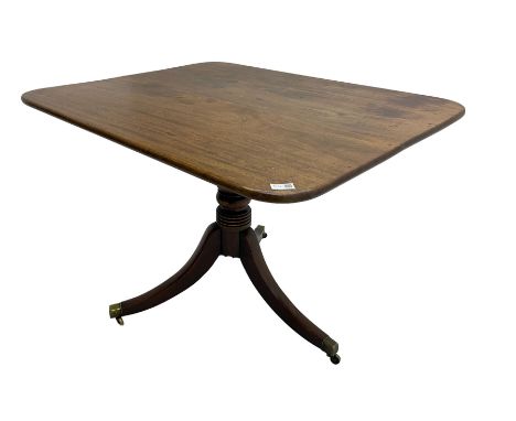 Regency mahogany tilt-top salon table, rectangular top with rounded corners, raised on turned pedestal with splayed tripod ba