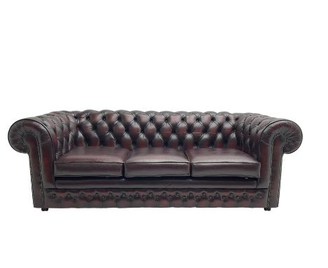 Thomas Lloyd - three seat Chesterfield sofa, upholstered in buttoned oxblood leather, on castors Dimensions: Height:&nbsp;70c