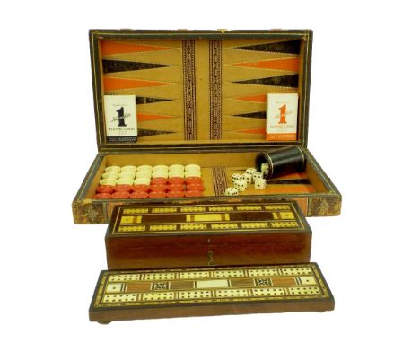 Leather backgammon chess board box and cribbage boards, with various counters, playing cards and dice etc, length of board 17