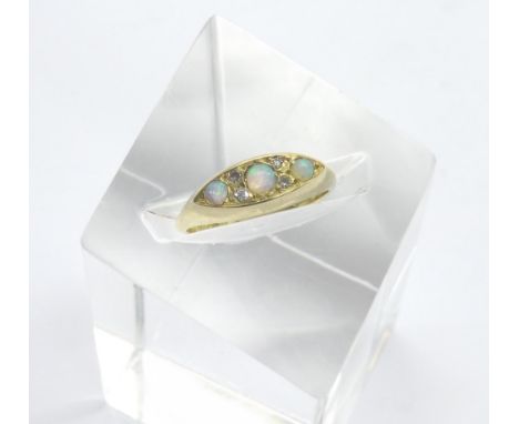 18ct yellow gold opal and diamond boat shaped ring, hallmarked Birmingham 1919, 3.8gm, ring size O