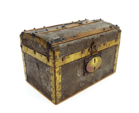Japanese embossed leather trunk of small proportions, the oak bound top decorated in relief with umbrellas and vases etc, the