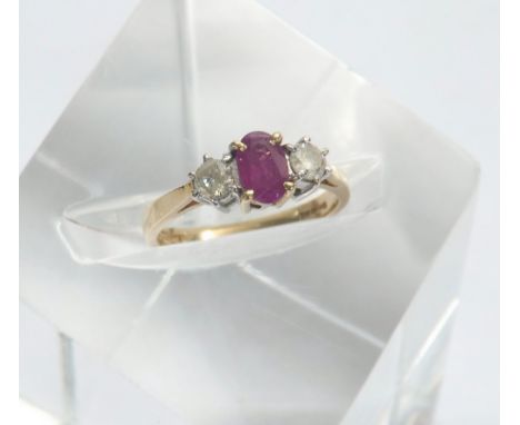 18ct yellow gold ruby and diamond three stone ring, the ruby 0.60ct approx,  flanked by two round-brilliant cut diamonds, 0.2