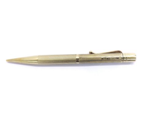 'Baker's Perm-Point' 9ct propelling pencil, Birmingham 1957, with engine turned decoration, plaque engraved D.I-J., 27.1gm, 4