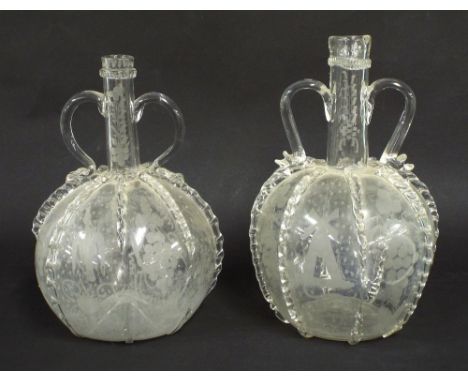 Matched pair of Continental antique glass twin handled globe decanters, decorated with panels of fruit, birds and windmills, 