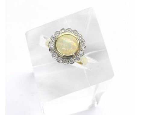 Attractive 18ct yellow gold opal and diamond cluster ring, the cabouchon opal within a surround of round-brilliant cut diamon