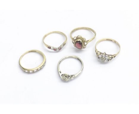 Ruby and diamond 9ct wishbone design ring; together with four other dress rings, 7.5gm (5)