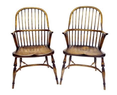 Pair of antique style Windsor stick back carver chairs, with elm seats and Carolean stretchers, 40" high, 23" wide