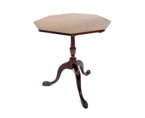 18th century flame mahogany tilt-top tripod table, the octagonal top over a baluster column and three splayed feet, 24" wide,