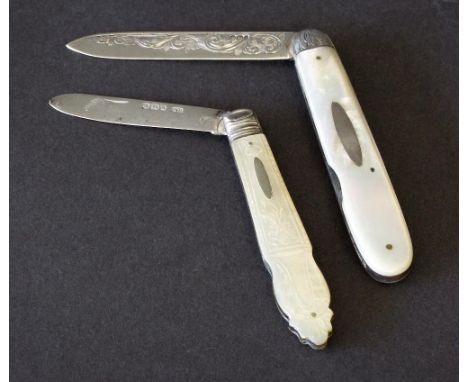 Two late Victorian silver and mother of pearl handled folding fruit knives, one by CWF, the other MB, 1893 and 1894 respectiv