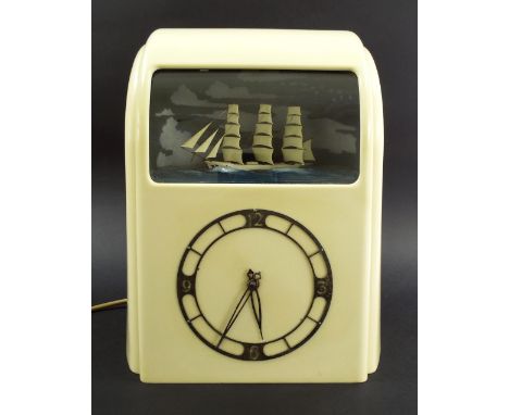 Vintage Vitascope Bakelite cased automaton clock fitted with a three masted ship, 13" high