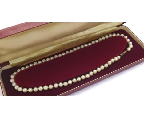 Cultured pearl necklet with a 9ct clasp, 17" long, boxed