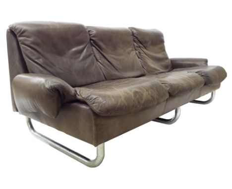 1960s hide leather and tubular chrome three seater sofa in the manner of De Sede, with good aged leather seat, 75" wide, 32" 