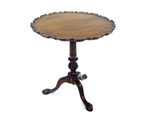 19th century mahogany tripod tilt-top table, the top with piecrust rim over a Corinthian column and three splayed claw and ba