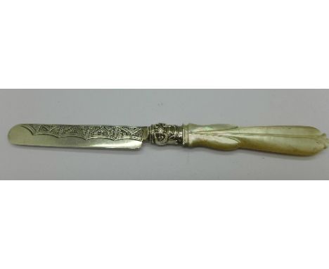 A butter knife with silver blade and mother of pearl handle by George Unite