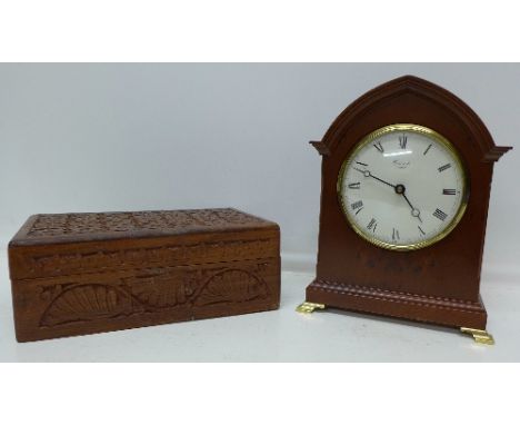 A Comitti London mantel clock and an Indian carved box, height of clock 22cm
