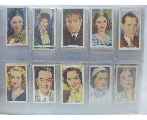 An album of cigarette cards; Gallaher My Favourite Part x2, Sporting Personalities x2, Dogs x2, Trains of The World, British 