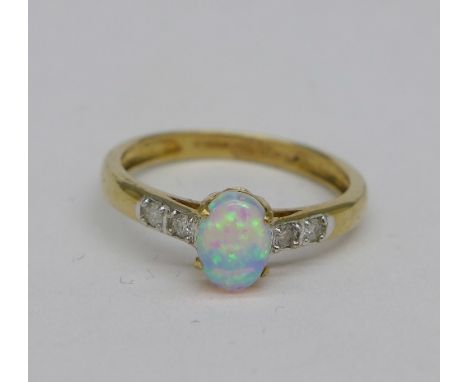 A 9ct gold ring set with diamonds and synthetic opal, 1.8g, O