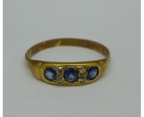 A 9ct gold, diamond and sapphire ring, 2.1g, R