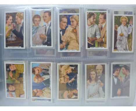 An album of cigarette cards; Gallaher Film Episodes x3, Famous Film Scenes, Army Badges x2, Film Partners x2, Wild Flowers x2