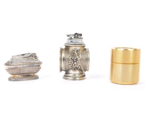 A collection of vintage 20th century table top cigarette lighters. To include a Ronson, made in England lighter with silver p