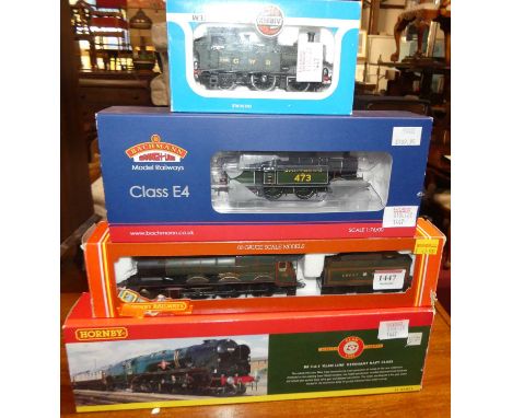 Four various boxed 00 gauge locomotives to include a Hornby Railways Clan Line Merchant Navy Class loco and tender, together 