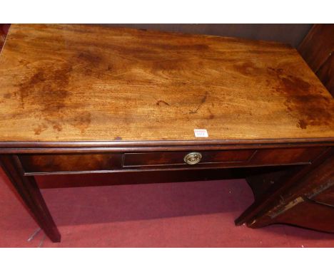 An early 19th century mahogany fold over card table, width 94cm