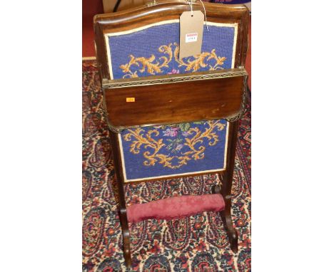 A French mahogany and tapestry inset fire screen with hinged platform