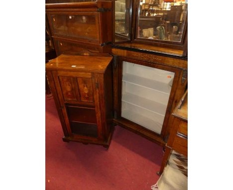 A Victorian figured walnut and satin wood inlaid and gilt metal mounted single door glazed pier cabinet, width 75cm, together