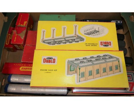 A tray of mixed 00 gauge and 0 gauge boxed locomotives, rolling stock and lineside accessories, to include a Hornby Dublo eng