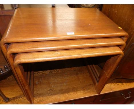 A nest of three 1970s O'Donnell Design teak round cornered occasional tables, the largest width 60cmTables are in good condit