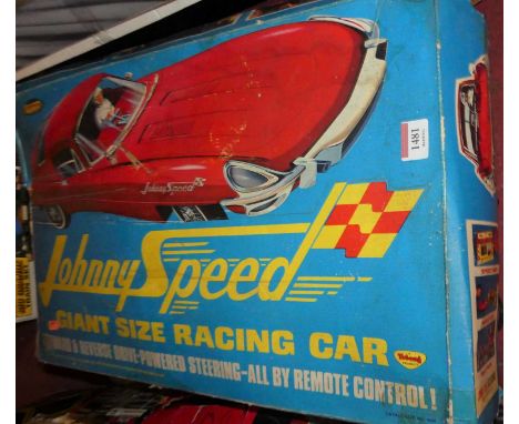 A Topper Toys Johnny Speed Giant Size replica racing car of a Jaguar, large plastic scale body in need of restoration housed 