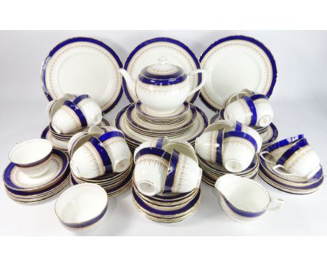 Extensive Royal Worcester Table Service decorated in the Regency pattern comprising; twelve dinner plates, twelve dessert pla