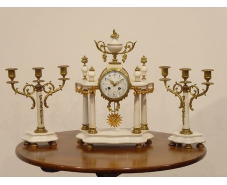 French white marble and gilt metal portico clock garniture, the movement with half hour strike on the bell, stamped F. W32cm,