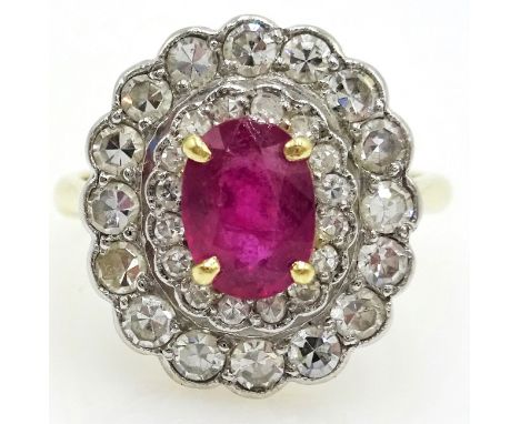 18ct Gold and platinum Cluster Ring set with an oval facet cut ruby surrounded by two tiers of brilliant cut diamonds hallmar
