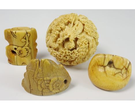 Japanese carved ivory Netsuke with floral decoration, two others and a carved puzzle bal - Roger Soame Jenyns Collection Cond