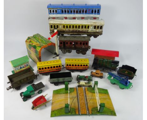 Three O gauge tin plate railway carriages, a Hornby tin plate tank engine and various other model railway items etc   Conditi