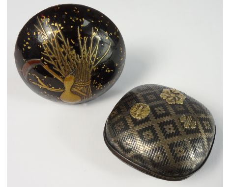 Japanese lacquer Kagamibuta Netsuke decorated with a scythe and corn sheath and with signature mark and a Japanese small meta