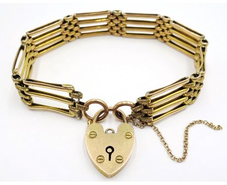 9ct Gold four bar gate link Bracelet with padlock clasp. (12gms)    Condition Report & Further Details   Click here for furth