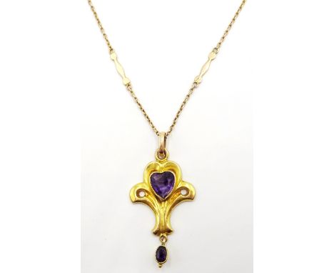 9ct Gold Pendant of scroll design set with a heart shape amethyst and with an amethyst drop on a 9ct. Gold chain   Condition 