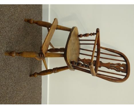 19th century yew and elm child's Windsor armchair, stick and pierced splat back, turned supports with crinoline stretcher, H9