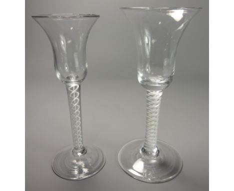 18th Century Cordial Glass with bell shaped bowl and cotton twist stem on a circular foot, 18cms high and a smaller cordial g