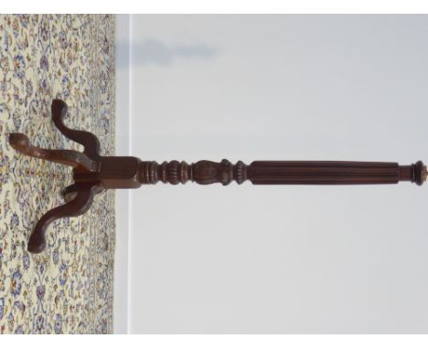 Early 20th century mahogany standard lamp, reeded and acanthus carved column, four splayed supports, with cream shade, H151cm