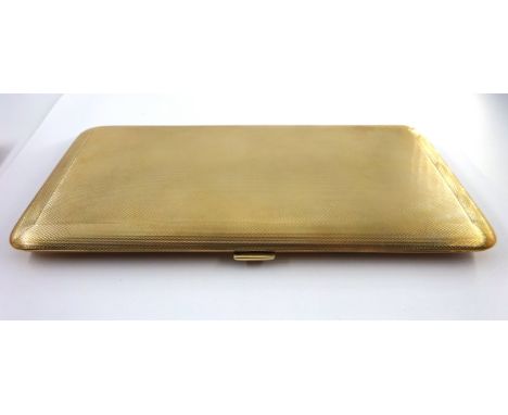 9ct gold engine turned Cigarette Case in a pig skin case, retailed by Ogdens Harrogate 17cms x 8cms (202.4gms).    Condition 