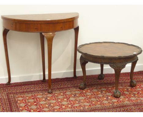Reproduction walnut demi-lune card table, figured book matched top, folding and baize lined, pullout action base with lined c