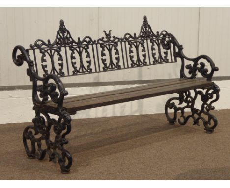 19th century heavy cast iron garden bench, scrolling foliage end rails, W163cm 