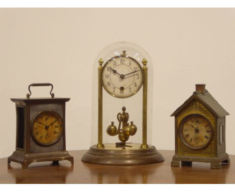 Mantel Timepiece in Japanese design tin plate case 18cms high, another of similar design and a three hundred and sixty five d