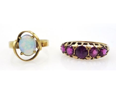 9ct Gold Dress Ring set with five graduated amethysts and a 9ct. Gold set with a single opal   Condition Report & Further Det